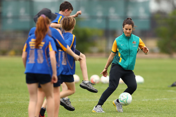 Selin Kuralay (right), capped 22 times for the Matildas, coaching primary school students in Shepparton in October.