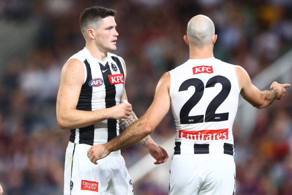 Magpies Jack Crisp and Steele Sidebottom during the team’s loss on Thursday.