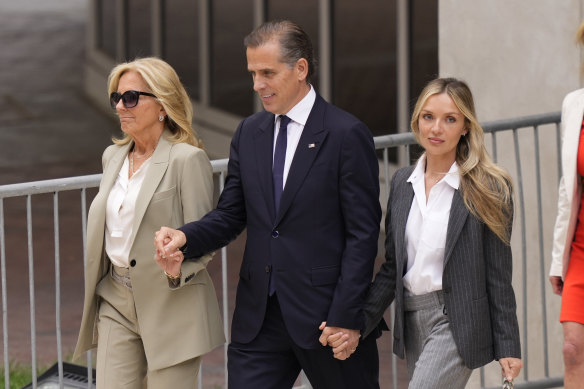 Hunter Biden with Jill Biden (left) and his wife, Melissa Cohen Biden, outside court after a jury found him guilty of gun charges in Delaware in June.