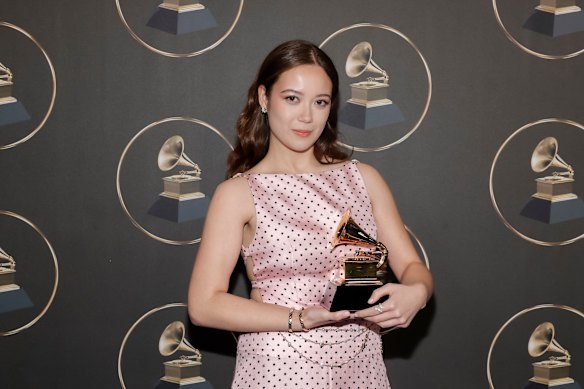 Laufey, at last year’s Grammys, with her trophy for best traditional pop vocal album for Bewitched.