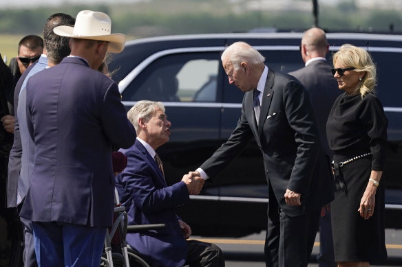 US President Joe Biden and first lady Jill Biden meet Governor Greg Abbott, of Texas, ahead of their visit to Robb Elementary School.