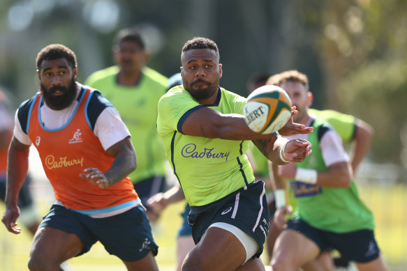 Samu Kerevi passing at training.