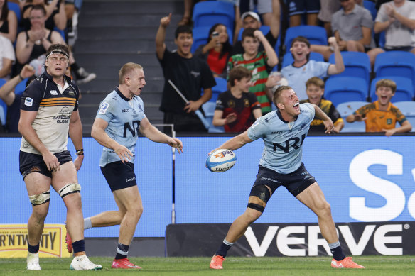 Joey Walton celebrates a try against the Brumbies.