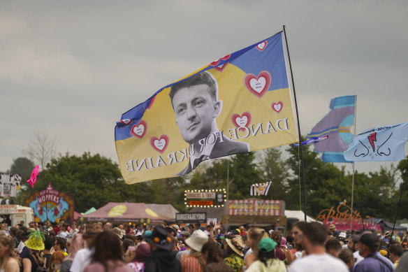 A flag with the image of Ukrainian President Volodymyr Zelenskyy and the words ‘Dance For Ukraine’ is seen at the Glastonbury Festiva.