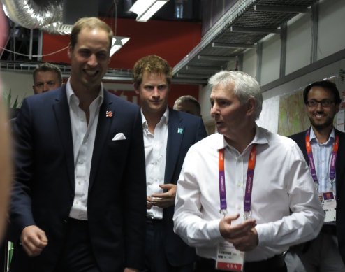 Gary Fenton shows Princes William and Harry around the Nine/Foxtel commutations centre at the 2000 London Olympics.