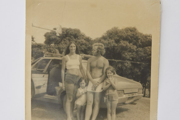 Deborah, aged two, with her mother, father and sister, Bec (at right), on the Sunshine Coast in 1976.