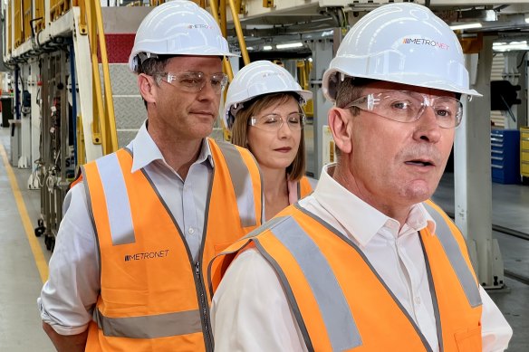 Follow the leader: Chris Minns with WA Premier Mark McGowan in December, inspecting his state’s railcar manufacturing.