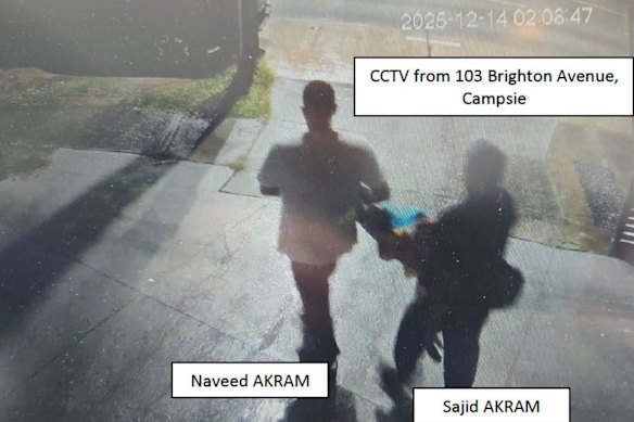 The men carrying items from their Campsie accommodation on the day of the alleged attack.