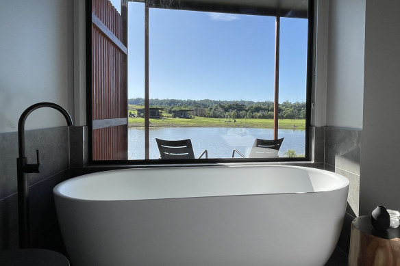 Free-standing tub with views.