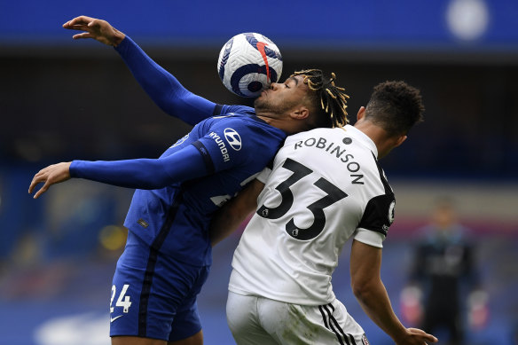 Reece James duels with Fulham’s Antonee Robinson.