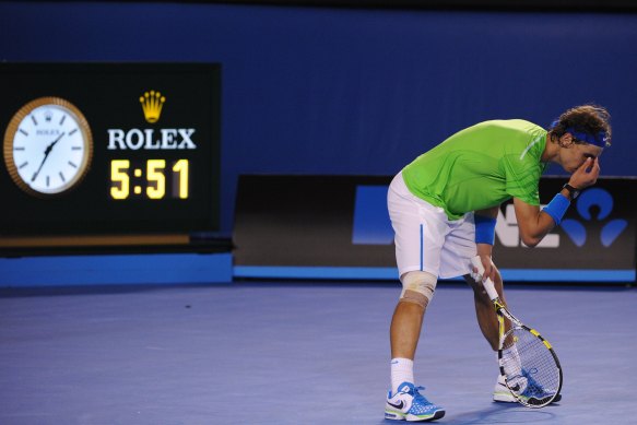 Physical slog: Rafael Nadal late in the 2012 Australian Open final.