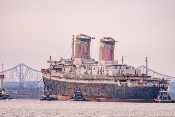 The ship leaves Philadelphia for its final voyage to an artificial reef off the coast of Florida.