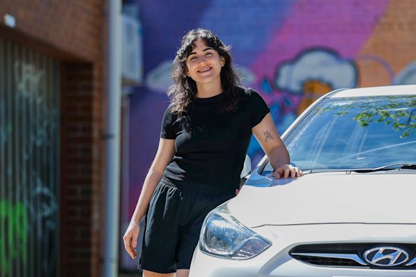 Personal trainer Jess Bricker recently bought her second-hand car from a dealership. The market has been flooded with supply as new electric vehicle converts offload their petrol cars. 