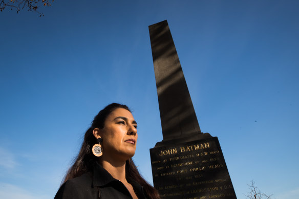 Gunai Kurnai woman Lidia Thorpe next to a monument to the "founder" of Melbourne, John Batman. "We need to start telling the true history of this country and not hide parts of it."