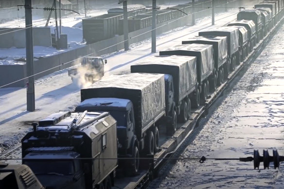 Russian military vehicles on a railway platform on their way to attend a joint military drills in Belarus.