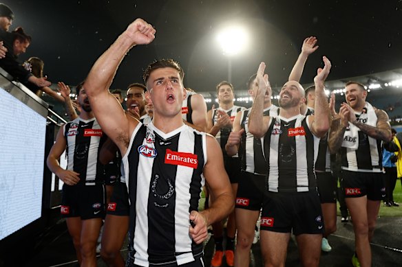 Nick Daicos leads the victorious Pies from the ground.