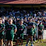  People stand for a moment of silence as Peter Meagher, a Bondi Beach mass shooting victim, is farewelled by Randwick at the Coogee Oval in Coogee before the Shute Shield game between Randwick and Eastern Suburbs