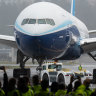 Boeing says pandemic will cut demand for planes for a decade