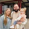Tim and Loren Horster-Haarburger with daughter Ivy at the Cobblebank home they sold in two weeks.