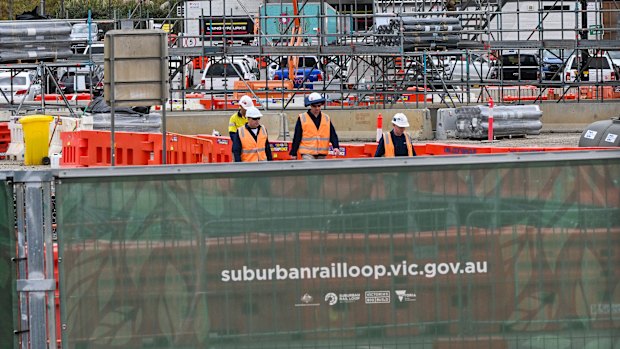 Workers at a Suburban Rail Loop construction site in Heatherton.
