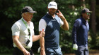 LIV Golf CEO Greg Norman with players Dustin Johnson and Phil Mickelson at a tournament in England this month.