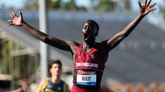BRISBANE, AUSTRALIA - DECEMBER 06: Gout Gout of Queensland celebrates winning the Boys’ U18 100m final during the 2024 Chemist Warehouse Australian All Schools Athletics Championship at Queensland Sport and Athletics Centre on December 06, 2024 in Brisbane, Australia. (Photo by Cameron Spencer/Getty Images)