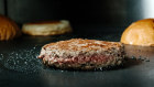 An Impossible Foods burger patty made from plant protein.