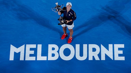 Ash Barty poses with the Daphne Akhurst Memorial Cup.