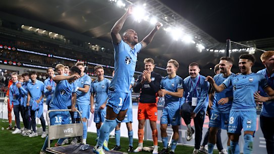 Douglas Costa leads the celebrations for Sydney FC.
