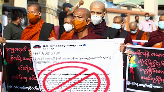 Buddhist monks participate in a protest against the election results with supporters of the Myanmar military and the military-backed Union Solidarity and Development Party near Shwedagon pagoda on Saturday.