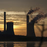 The coal-fired Plant Scherer, one of the top carbon dioxide emitters in the US, stands in the distance in Juliette, Georgia.