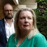 Reina Nicholls with her neighbour Hugh Woodgate in front of a collapsing retaining wall at her home which is being damaged by construction next door on O’Sullivan Road in Bellevue Hill,