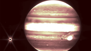In an undated image provided by NASA, and other agencies, Jupiter, center, and its moon Europa, left, seen through the James Webb Space TelescopeÕs NIRCam instrument 2.12 micron filter.