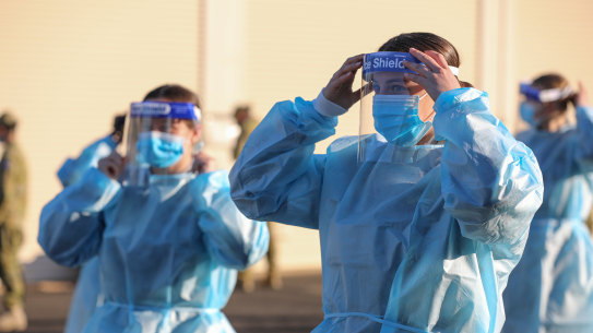 Some teachers will need to wear full body protective gear as close contact VCE students are given exemptions to sit exams.