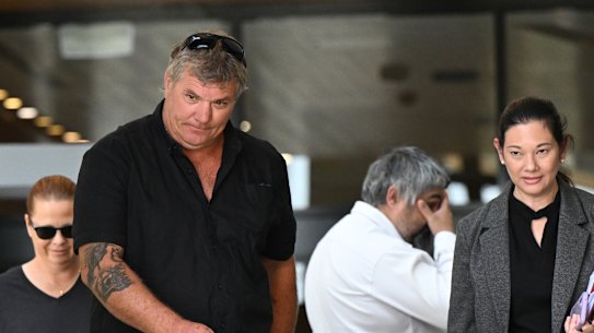 Brian Allan Smith (left) and barrister Amanda Rossow (right) leave Ipswich Magistrates' Court on Wednesday.