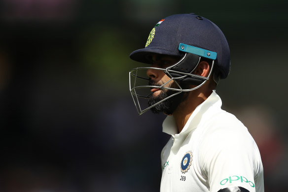 A dejected Virat Kohli after being dismissed by Josh Hazlewood in Sydney in January 2019.