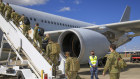 Air Force and Army personnel leave Amberley in Queensland to travel to the Middle East to support an effort to evacuate people from Afghanistan.