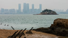 Lion Rock, the closest of Taiwan’s territory to China. On many Kinmen Islands beaches are anti-landing spikes. Behind is the Chinese city of Xiamen, just 3km to the West.