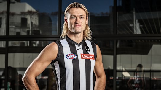 Darcy Moore returns to lead Collingwood.