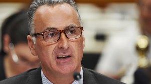 NSW Multiculturalism Minister John Sidoti at a budget estimates hearing.