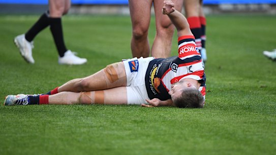 Sam Walker after injuring his knee on Sunday.