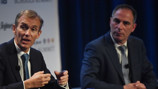 NSW Education Minister Rob Stokes, left, and Labor's education spokesman Jihad Dib make their points at The Sydney Morning Herald's Schools Summit on Monday. 