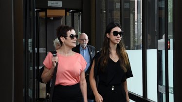 Brenda Lin (right) leaves the NSW Supreme Court complex after the Court of Criminal Appeal dismissed her uncle Robert Xie’s appeal.