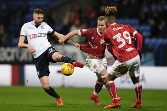 Mark Beevers, left, in action for the Bolton Wanderers. Beevers is now Australia-bound, having signed a two-year contract with Perth Glory.