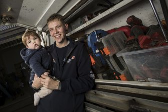 Third-year apprentice plumber Ketta Jackson, with nine-month-old son Ziggy, wishes she had started plumbing earlier.