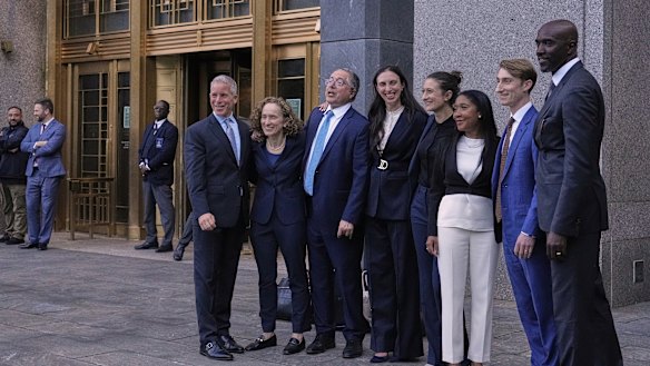 Defence attorneys for Sean “Diddy” Combs, including from left, Brian Steel, Alexandra Shapiro, Marc Agnifilo and Teny Garagos and Xavier Donaldson, far right, line up for a group photo outside Manhattan federal court after Sean “Diddy” Combs was denied bail after being convicted of prostitution-related offenses but acquitted of sex trafficking and racketeering charges, in July in New York.