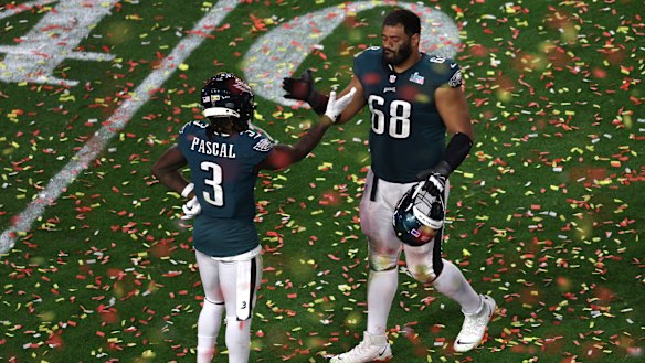 Jordan Mailata (right) with Eagles teammate Zach Pascal after the Super Bowl.