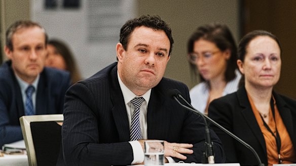 Penrith MP Stuart Ayres at NSW Parliament estimates answering questions about $12m funding from his sports department. 