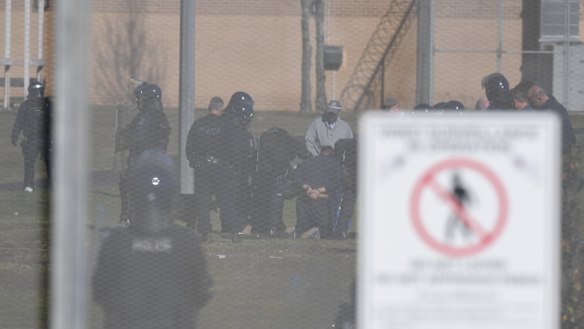 Detainees being arrested.