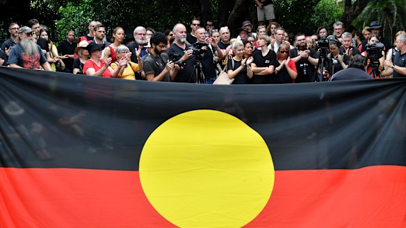 Wangan and Jagalingou traditional owners and their supporters are seen protesting outside Parliament House in Brisbane last year.